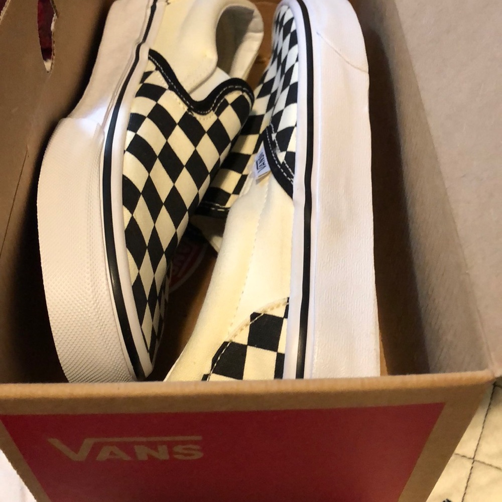 Size 7 1/2 never worn classic slip on Vans